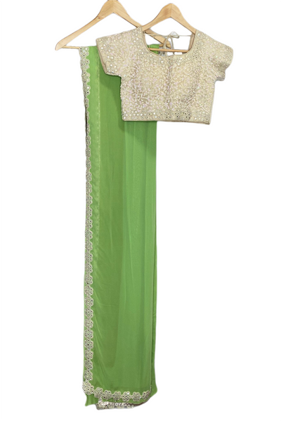 Georgette lime green saree with mirror work and sequins border
