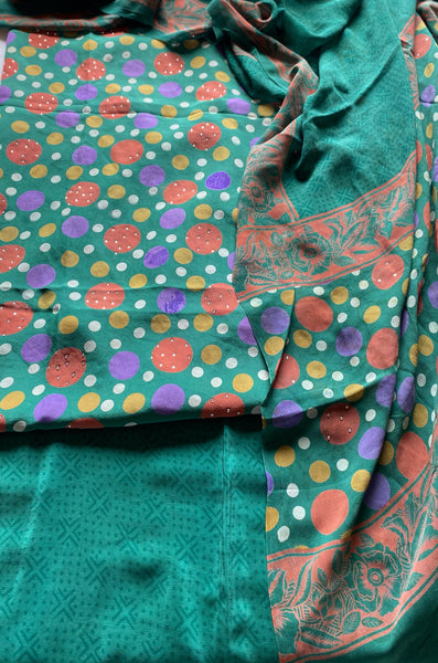 Unstitched Suit Material Shirt: Printed Crepe De Chine with Stone Work Salwar: Printed Crepe De Chine Dupatta: Printed Georgette with Stone Work Colour: Teal
