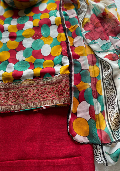 Unstitched Suit Material Shirt: Printed Butter Crepe with Mukesh Work & Border at Bottom Salwar: Self-Print Butter Crepe  Dupatta: Printed Chiffon  Colour: Red